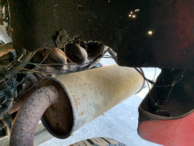 Exhaust (Left) (From Wheel Well).jpg